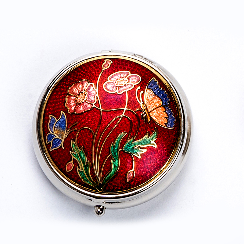 Small round-shaped enamel pillbox